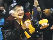  ?? Kevin C. Cox / Getty Images ?? Sister Jean Dolores Schmidt has become a national sports celebrity with Loyola’s unexpected run to the Final Four.