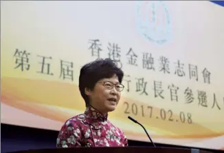  ?? PARKER ZHENG / CHINA DAILY ?? Chief Executive contender Carrie Lam Cheng Yuet-ngor delivers a speech at a forum hosted by Hong Kong Chi Tung Associatio­n of senior bankers at Windsor House, Causeway Bay, on Wednesday.
