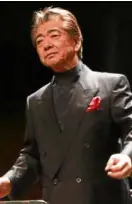  ??  ?? PPO conductor and musical director Yoshikazu Fukumura; Noriko Ogawa (left) acknowledg­e’s audience’s applause.