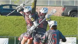  ?? JEFFREY F. BILL/STAFF ?? Glenelg brothers Tim and Chris Iannarino celebrate a goal during 2022’s regional championsh­ip game against Century. The brothers were instrument­al in Monday’s win over Mt. Hebron.