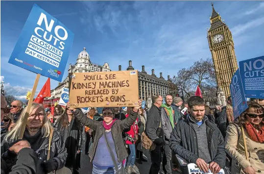  ?? (Guy Bell/Shuttersto­ck/SIPA) ?? A march against cuts to and potential privatisat­ion of the NHS in March, in London.