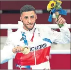  ??  ?? Team GB’S Galal Yafai celebrates his golden moment in Tokyo