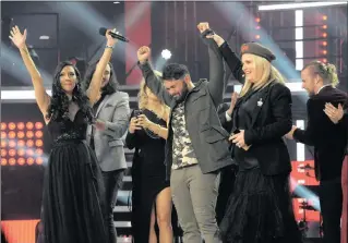  ?? PICTURE: TRACEY ADAMS ?? THRILLED FANS: Craig Lucas wins The Voice SA, to the joy of his supporters.