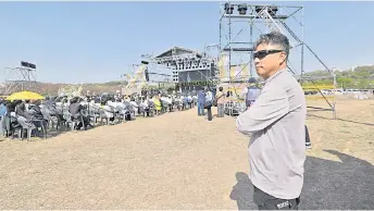  ?? ?? Jung Sung-wook (right), his teenage son died when the overloaded Sewol ferry capsized off South Korea’s southern coast a decade ago, a ending a memorial event to mark the 10th anniversar­y of South Korea’s Sewol ferry disaster at a park in Ansan.