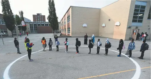  ?? - La Presse canadienne: Nathan Denette ?? Cette année, la pandémie amène les écoles à rompre avec la tradition des photos de classe.