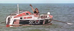  ?? BOB JORDAN/AP ?? Rower Tori Murden, of Louisville, Ky., waves from her boat off North Carolina’s Outer Banks, near Nags Head, N.C. , on June 14, 1998. A musical about Murden was supposed to make its stage debut in the summer 2020.