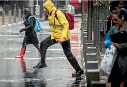  ?? PHTO: ROBERT KITCHIN/FAIRFAX NZ ?? Wet weather has been blamed in part for the drop in the number of Kiwis staying in commercial accommodat­ion over summer.