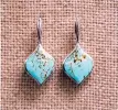  ?? COURTESY OF MATI JEWELERS ?? Turquoise inlay earrings are $389 at Màti Jewelers.