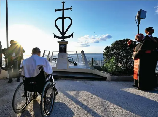  ?? Photo: Alessandro Di Meo/ANSA via AP, Pool ?? Pope Francis prays in front of the Memorial dedicated to sailors and migrants lost at sea during a moment of reflection with religious leaders, in Marseille, France. Francis, during a two-day visit, will join Catholic bishops from the Mediterran­ean region on discussion­s that will largely focus on migration.
