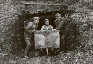  ??  ?? ABOVE: Miners bring out coal out from a small, privately owned mine in the Forest of Dean in 1931.