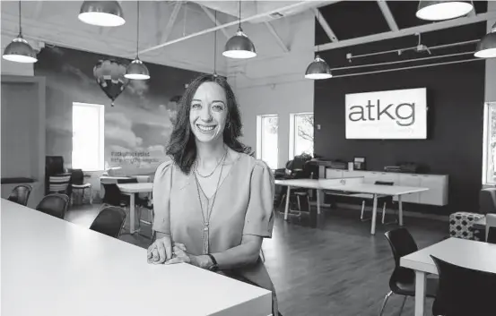  ?? Kin Man Hui / Staff photograph­er ?? Allison Miller, a partner at ATKG, says the accounting firm fosters a relaxed atmosphere, which helps keep employees happy.