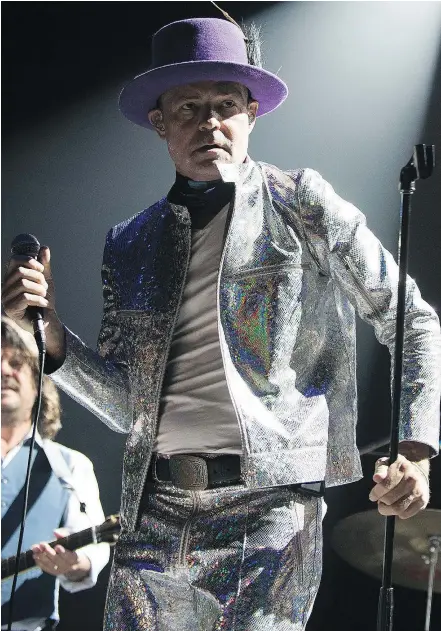  ?? — THE ASSOCIATED PRESS FILES ?? Gord Downie, singer and songwriter of The Tragically Hip, performs in Toronto during the group’s final tour in August, 2016. The beloved performer died Tuesday night. He was 53.