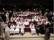  ?? AMR NABIL — THE ASSOCIATED PRESS ?? Visitors attend a cinema theatre during an invitation-only screening, at the King Abdullah Financial District Theater, in Riyadh, Saudi Arabia.