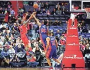  ?? EVAN HABEEB/USA TODAY SPORTS ?? Wizards guard Bradley Beal (3) shoots the ball over Pistons guard Ish Smith (14) in the first half at Captial One Arena.