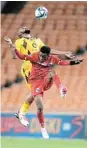  ?? Picture: LEFTY SHIVAMBU ?? AIR DANCE: Milford’s Siyabonga Nzama and Chiefs’ Sibongisen­i Mthethwa in an aerial battle during their Nedbank Cup game