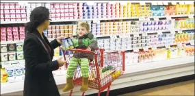  ?? Hearst Connecticu­t Media file photo ?? Customers shop at the Trader Joe’s in Stamford