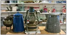  ??  ?? Coffee pots and a lantern can be bought at the country store.