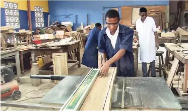  ?? CONTRIBUTE­D ?? A student does woodwork at the St Margaret’s Human Resource Centre, St Andrew.