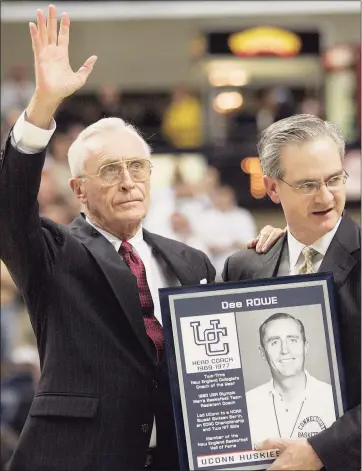  ?? Bob Child / Associated Press file photo ?? Former UConn men’s basketball coach Dee Rowe waves to the crowd after he was presented with a plaque by UConn Director of Athletics Jeff Hathaway at a 2007 ceremony in Storrs.