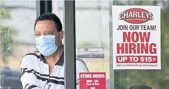  ?? AP FILE ?? PAYING THE PRICE: Hiring in the United States picked up in May yet was slowed again by the struggles of many companies to find enough workers to keep up with the economy’s swift recovery from the pandemic recession.