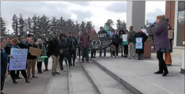  ?? LISA MITCHELL — DIGITAL FIRST MEDIA ?? During the Kutztown Resist Solidarity March on the Kutztown University campus on Feb. 16, a rally was held on the steps of Academic Forum. Speakers included Kutztown APSCUF President Amanda Morris, a KU professor.