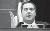  ?? CHIP SOMODEVILL­A/GETTY ?? Rep. Devin Nunes asks a question during testimony on a whistleblo­wer complaint Thursday in Washington.