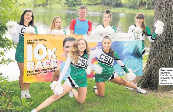  ??  ?? On course Raymond Evenden with University of Stirling cheerleade­rs