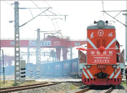  ?? LI YIBO / XINHUA ?? A Chang’an internatio­nal freight train, loaded with 160 imported vehicles arrives at Xi’an from Belgium, on June 13. In the past five years, the coverage of such trains from Xi’an, the starting point of the ancient Silk Road, has extended from Central Asia to the hinterland of Europe.