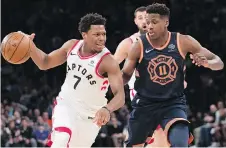  ?? MARY ALTAFFER/THE ASSOCIATED PRESS ?? Toronto Raptors guard Kyle Lowry drives to the basket against New York Knicks guard Frank Ntilikina during the first half in New York on Sunday. The Raptors won 132-106.