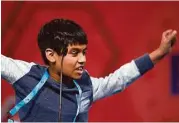  ?? Cliff Owen / Associated Press ?? Nihar Janga, 11, of Austin celebrates Thursday after correctly spelling a word during the final round of the Scripps National Spelling Bee.