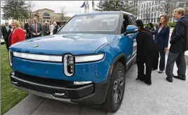  ?? HYOSUB SHIN/AJC 2021 ?? Rivian got a package of inducement­s that persuaded the electric vehicle maker to locate a $5 billion manufactur­ing plant about an hour east of Atlanta.