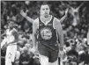  ?? DAVID ZALUBOWSKI/AP ?? Golden State’s Stephen Curry reacts after hitting a 3-pointer against the Denver Nuggets on Tuesday.