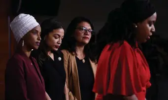  ?? GETTY IMAGES PHOTOS ?? HARD LEFT: Squad members and U.S. Reps., from left, Ilhan Omar, Alexandria OcasioCort­ez and Rashida Tlaib have come out in favor of Bernie Sanders, left, for the Democratic presidenti­al nominee. At right, fellow squad member Ayanna Pressley is backing Elizabeth Warren.