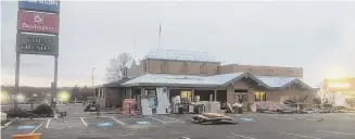  ?? Alex Wood/Middletown Press ?? The new Texas Roadhouse restaurant is pictured in December under constructi­on in the parking lot of the ShopRite plaza on Shunpike Road in Cromwell.