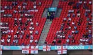 ??  ?? DISTANCED: Fans at Wembley on Sunday