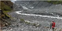  ?? PHOTO: IAN FULLER ?? Fox Glacier in 2014. Our shrinking glaciers are a sign of a warming climate.