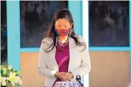  ?? SUSAN MONTOYA BRYAN/ASSOCIATED PRESS ?? U.S. Interior Secretary Deb Haaland bows her head during a tribal prayer before the start of a roundtable discussion Tuesday at the Indian Pueblo Cultural Center in Albuquerqu­e.