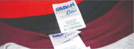  ?? GILDAN ?? As shares dropped by a third on Friday, Montreal-based Gildan said the weaker-than-expected demand for its stamp-on logo apparel business would continue.