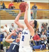  ?? / Scott Herpst ?? Ringgold’s Riley Nayadley puts up a shot during Friday’s Region 6-AAA showdown with Coahulla Creek. Nayadley had 17 points and 10 rebounds, but the Lady Tigers suffered their first region loss of the year, 47-44.4.