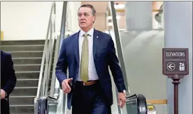  ?? / AP-Alex Brandon, File ?? Sen. David Perdue, R-Ga., arrives on Capitol Hill, in Washington on Oct. 4. A Georgia Tech political group says Perdue snatched a phone from a student who was video recording while asking the Republican lawmaker a question about Georgia’s governor’s race.