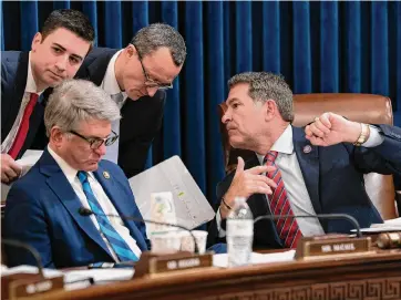  ?? Photos by J. Scott Applewhite/associated Press ?? House Homeland Security Committee Chairman Mark Green, R-tenn., right, confers with staff during debate over impeaching Secretary of Homeland Security Alejandro Mayorkas.