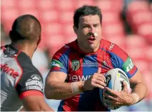  ?? GETTY IMAGES ?? Retired Newcastle Knights winger James McManus in action against the Warriors in 2015.