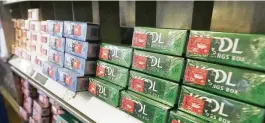  ?? JEFF CHIU / AP ?? Menthol cigarettes and other tobacco products are displayed at a store in San Francisco in, 2018. Cigarette companies have targeted advertisin­g of menthol cigarettes toward Black Americans and youth, an upcoming summit to be held at the Sinclair Conference Center says.