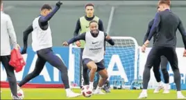  ?? AP ?? Raheem Sterling (centre) with his England teammates at a training session on Tuesday.