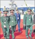  ?? VINAY PANDEY AND DEEPAK GUPTA//HT PHOTOS ?? (Clockwise from top) A soldier performing during the inaugural ceremony; Korean delegates and Marcos commandos of the Indian Navy giving live demos at the Gomti riverfront on Wednesday.