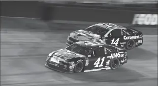  ?? ASSOCIATED PRESS ?? KURT BUSCH (41) DRIVES BELOW Clint Bowyer Jr. during the NASCAR Cup Series auto race Saturday in Bristol, Tenn. STILL SEEKING A BRISTOL WIN