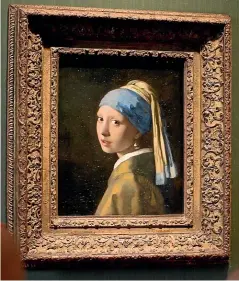  ?? AP ?? Johannes Vermeer’s Girl with a Pearl Earring is among the works that have been attacked by climate activists.