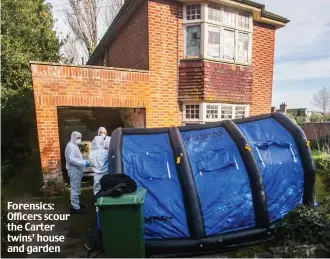  ?? ?? Forensics: Officers scour the Carter twins’ house and garden