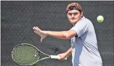  ?? Jeremy Stewart / Rome News-Tribune ?? Model’s Kyle Hale follows the ball before hitting a return during his No. 1 singles match in the second round of the Class AA state playoffs Thursday at the Rome Tennis Center at Berry College.