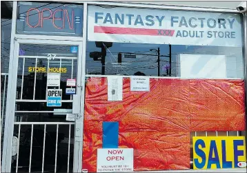  ?? STEVE BOSCH/PNG FILES ?? Thousands of DVDs were seized last week in raids on a central warehouse and six Fantasy Factory adult video stores in Metro Vancouver.